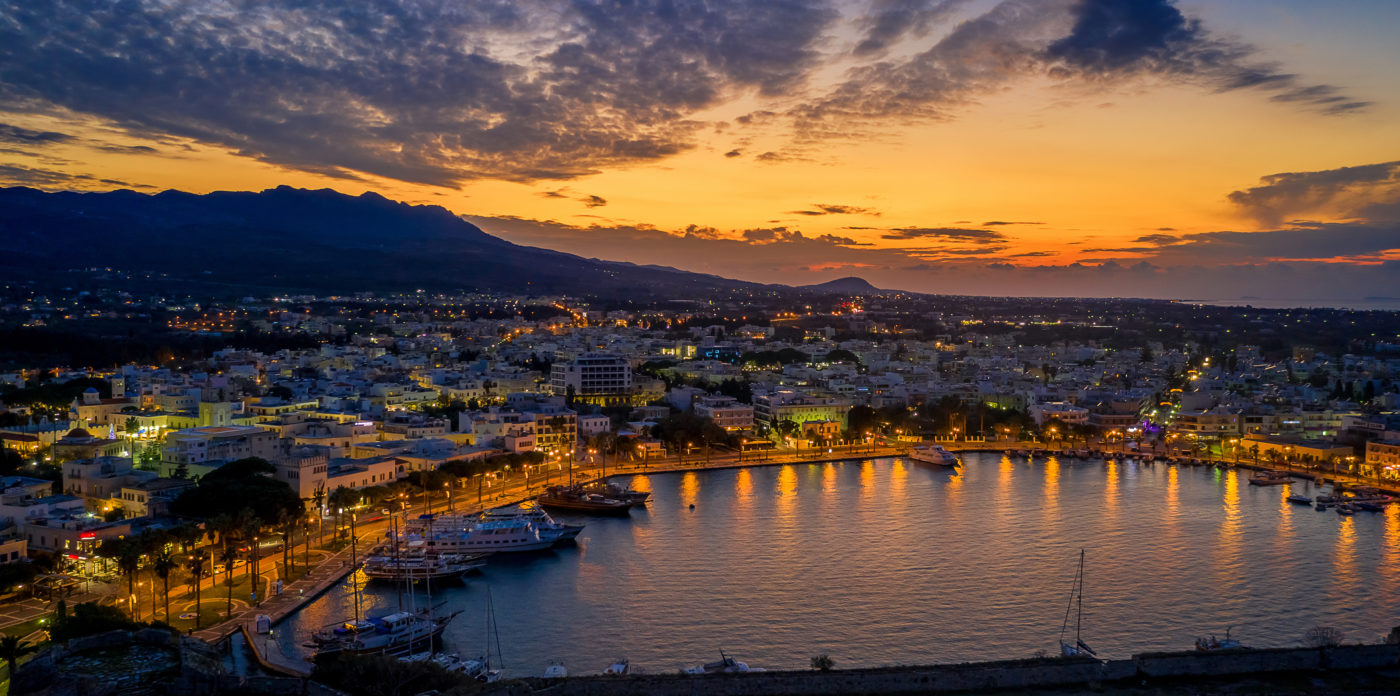 Kos Island private transfers — sunset over the port